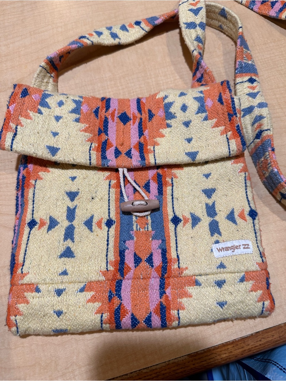 Wrangler Beige Crossbody Bag with Orange & Blue Patterned Weave